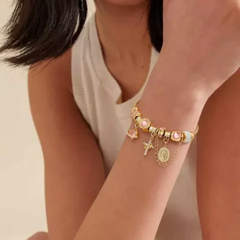 Every charm tells a chapter – start their story today: Vintage Virgin Mary & Cross Charm