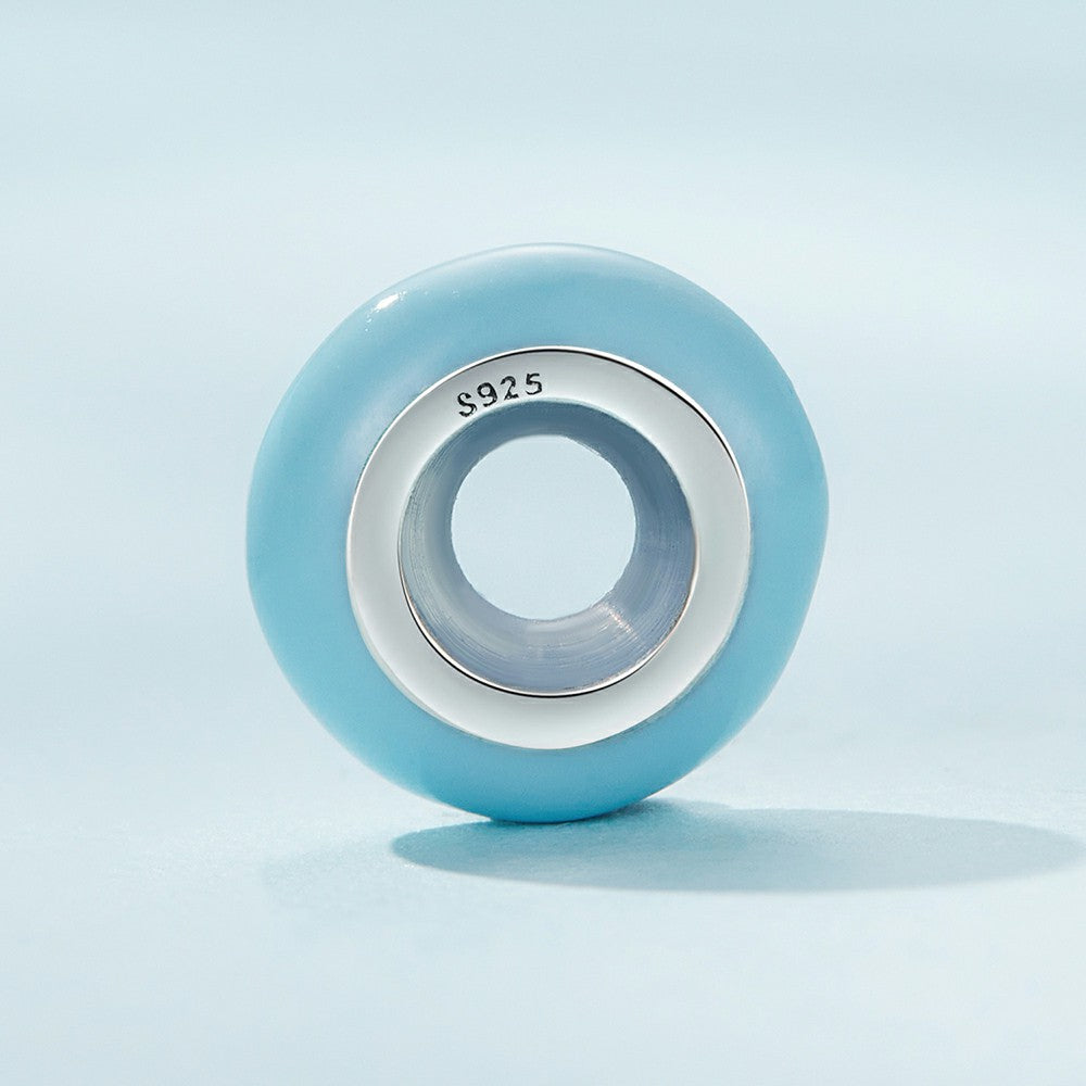 Every charm tells a chapter – start their story today: Macaron Cyan Stopper Charm Spacer