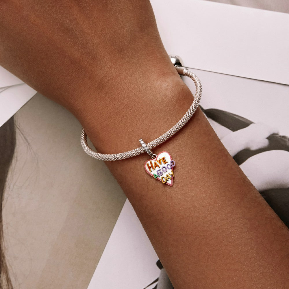 Every charm tells a chapter – start their story today: Have a Good Day Heart Dangle