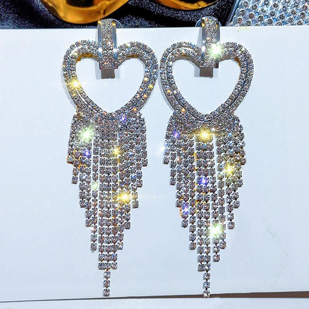 A promise that fits perfectly: Heart-shaped Tassel Drop Earrings Silver