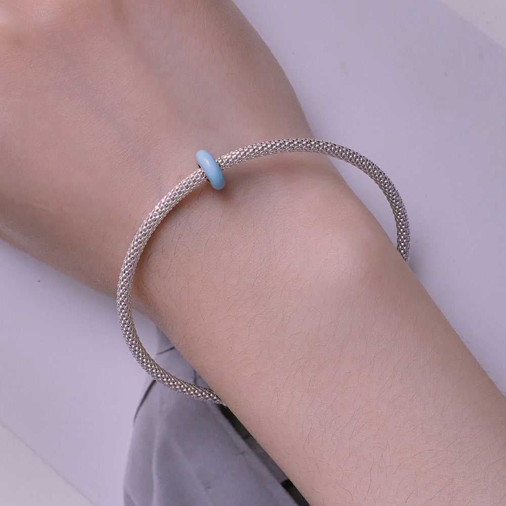 Every charm tells a chapter – start their story today: Macaron Cyan Stopper Charm Spacer